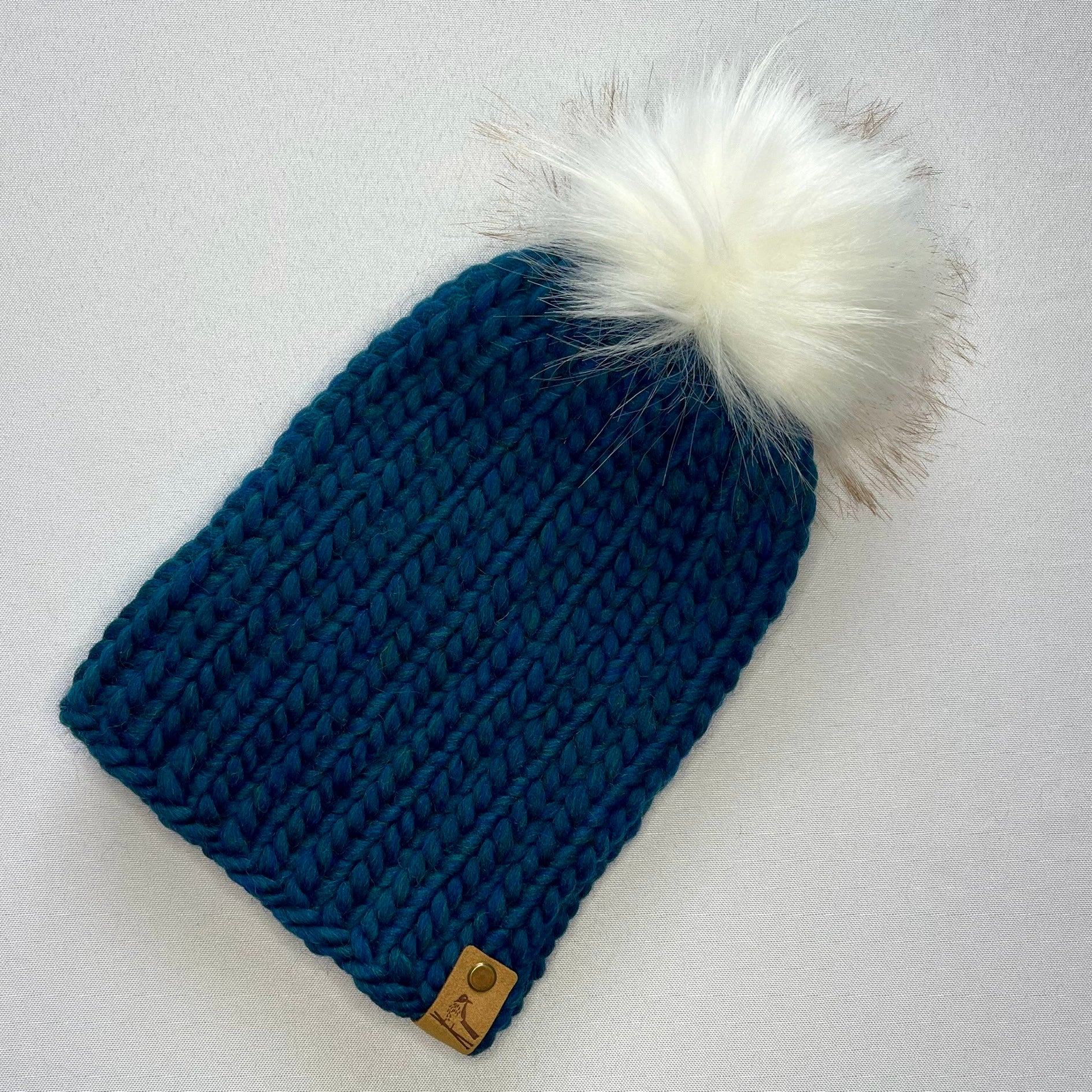 Blue pom pom hat fashion