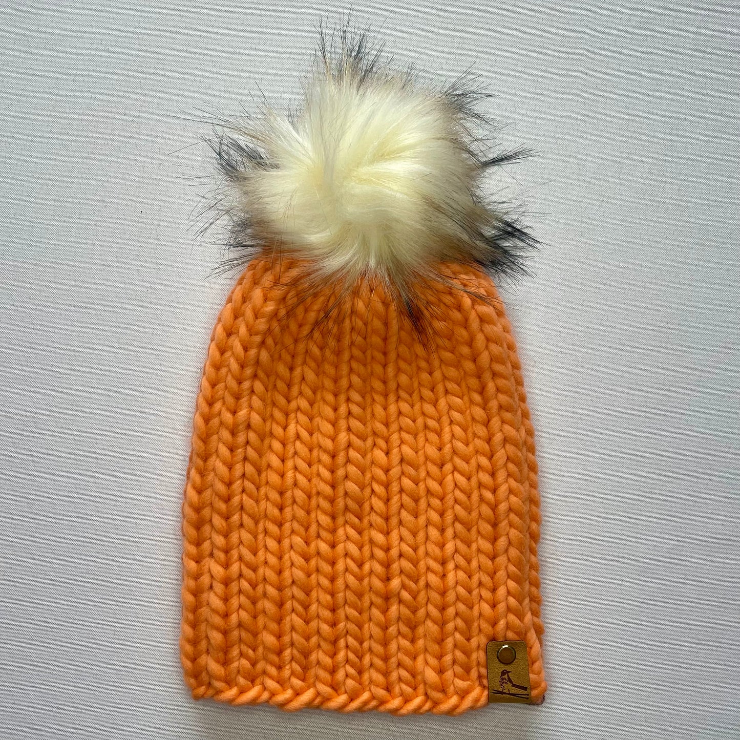 Peach Peruvian Wool Knit Hat with Faux Fur Pom Pom