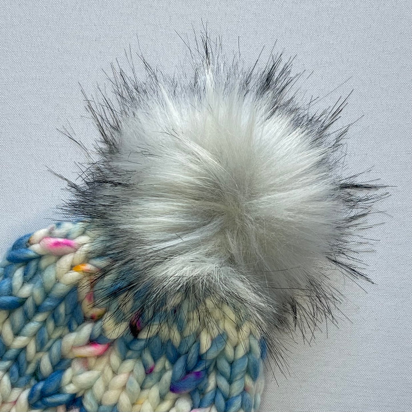 Blue and White Merino Wool Knit Hat with Faux Fur Pom Pom